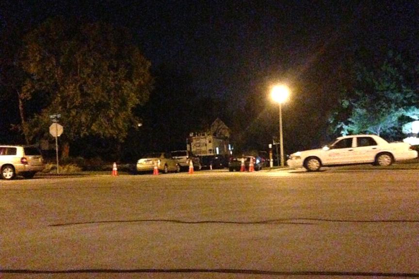 Police cars surround the house in the McConnells neighborhood.