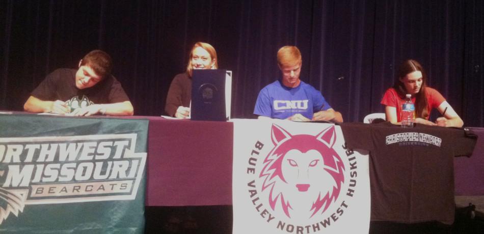 Four+athletes+commit+to+colleges+in+spring+signing