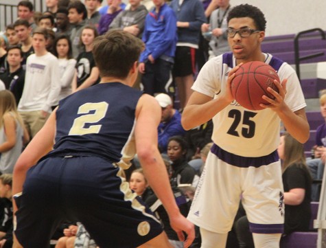 Boys varsity basketball defeats STA on senior night