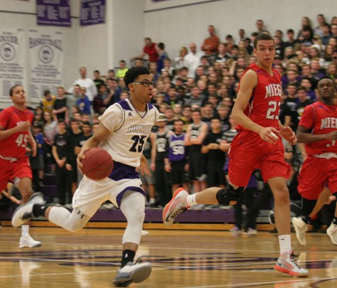Boys varsity basketball defeated by Bishop Miege