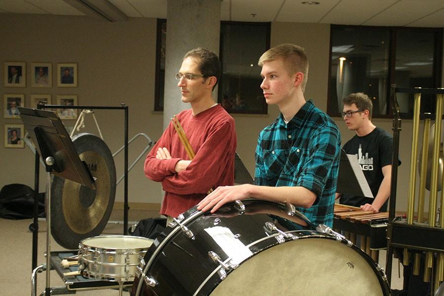 Senior Camden Hatley plays the bass drum at a rehearsal for the KC Civic Orchestra Feb. 23 at Lutheran Atonement Church.