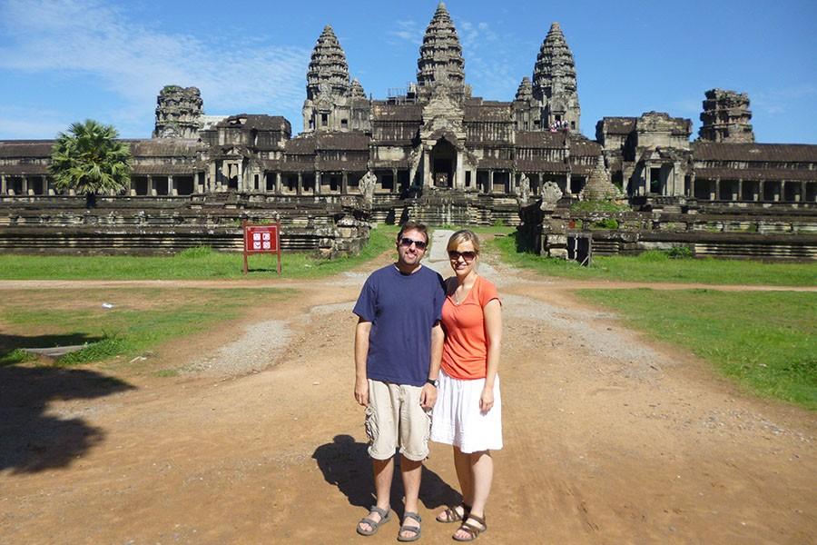 Mike Arbucci stands with his wife in front of Angkor Wat just outside of Siem Reap during his summer trip to Cambodia, 2014 (photo courtesy of Arbucci).