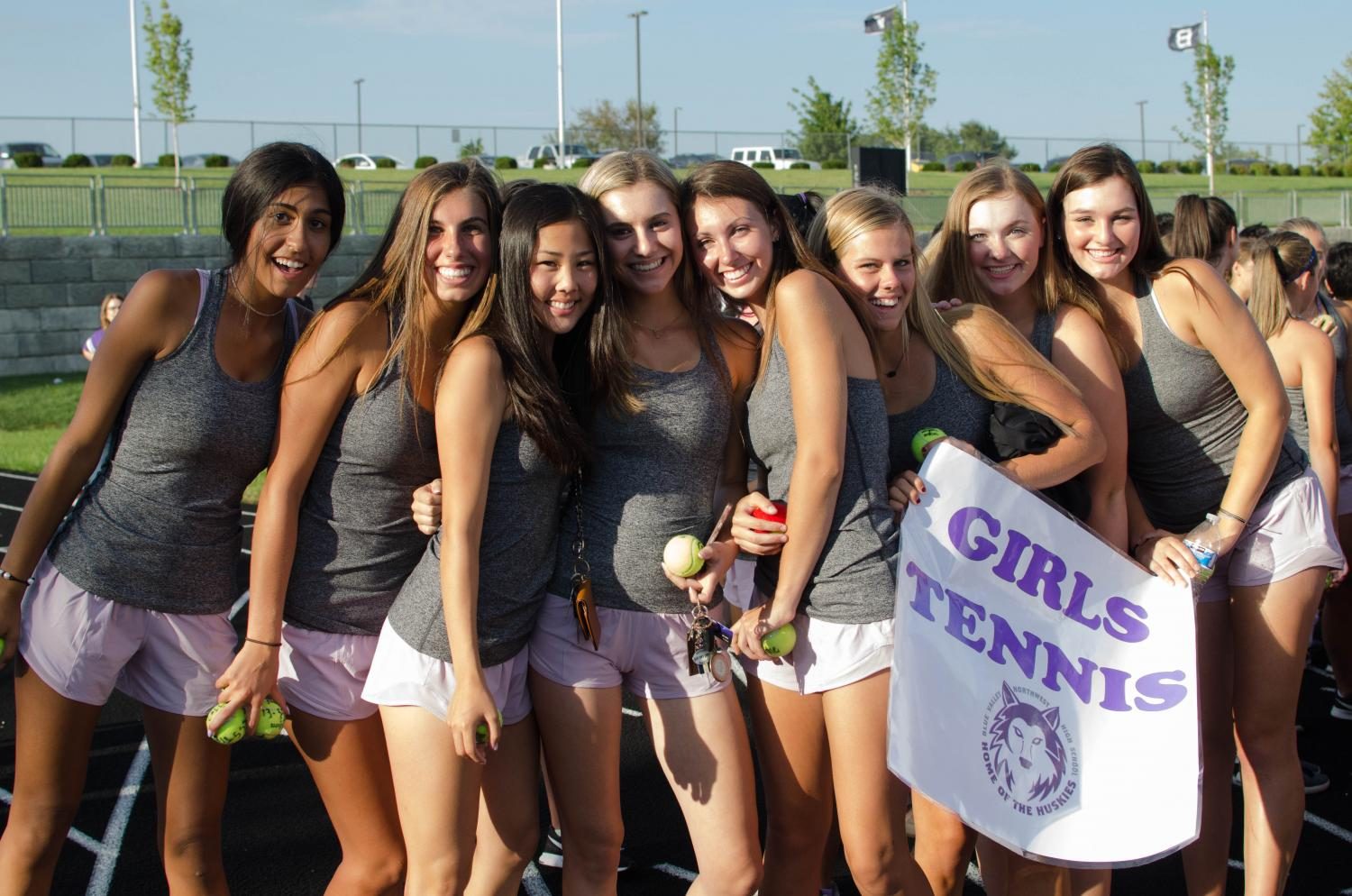 The girls tennis team at Husky Night.