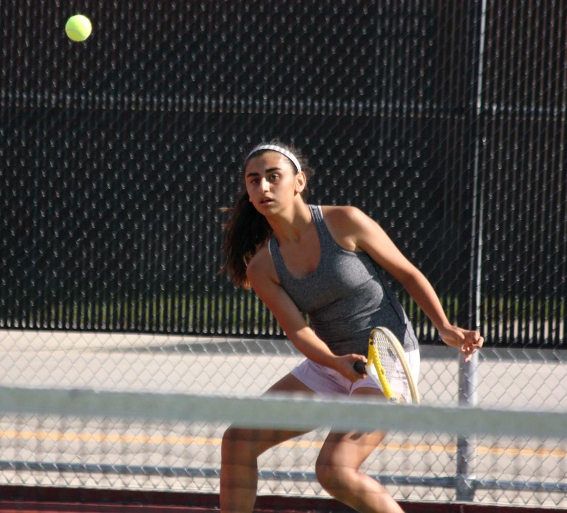 Fallahian returns a ball with a forehand during her match on Aug. 28. 