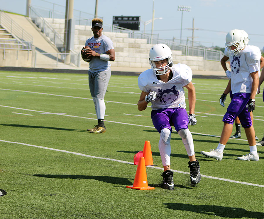 Senior wide receiver Zachary Stephens goes through a drill during a Husky football practice Tuesday Aug. 22.  