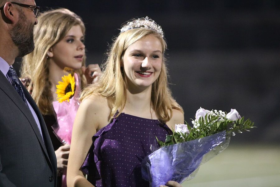 Senior Ellie Hobbs smiles after being crowned Homecoming Queen Oct. 5 at the DAC.