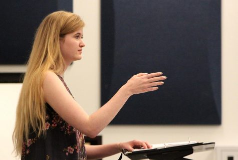 Sallman conducts the freshman girls concert choir during their rehearsal.