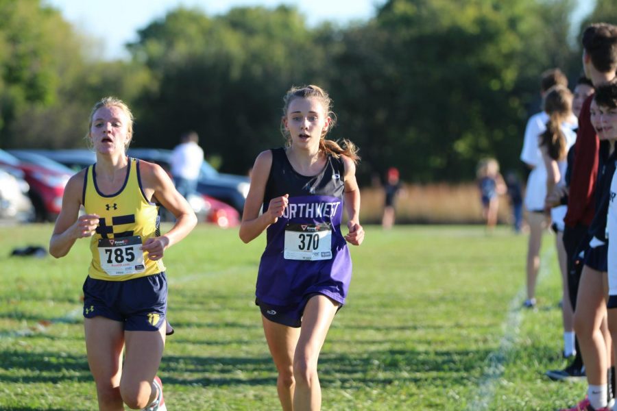 Going into the third mile at EKL championships, Beach battles for the lead on Oct. 12 at Johnson County Community College.