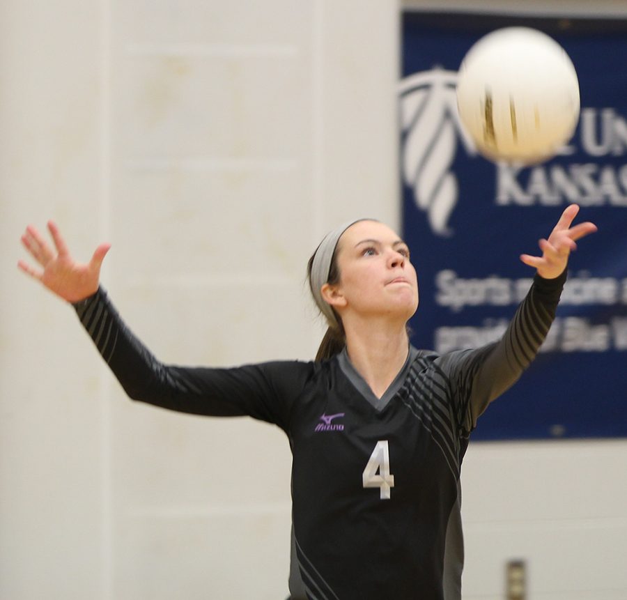BVNW senior Laura Bredemeier (4) serves the ball against Shawnee Mission West at BVNW Oct. 16.