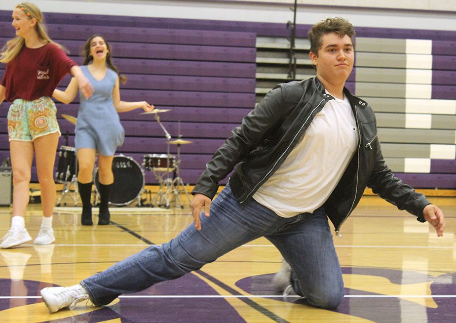 Freshman Sam Wise gets up after doing the splits during the freshmen skit.
