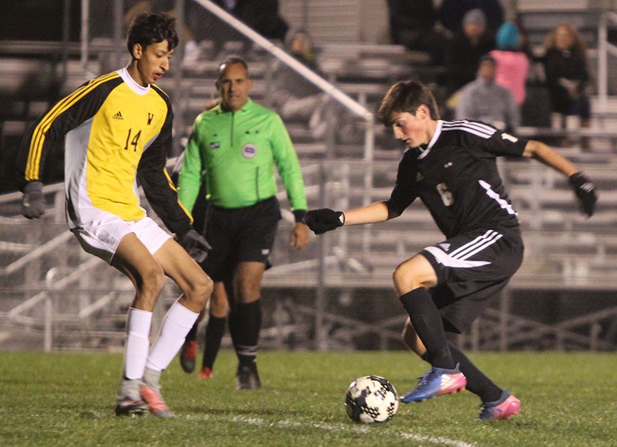 BVNW sophomore J.P. Pascarella attempts to create momentum offensively after being down a goal against Shawnee Mission West during the second half at the SMSC Oct. 24.