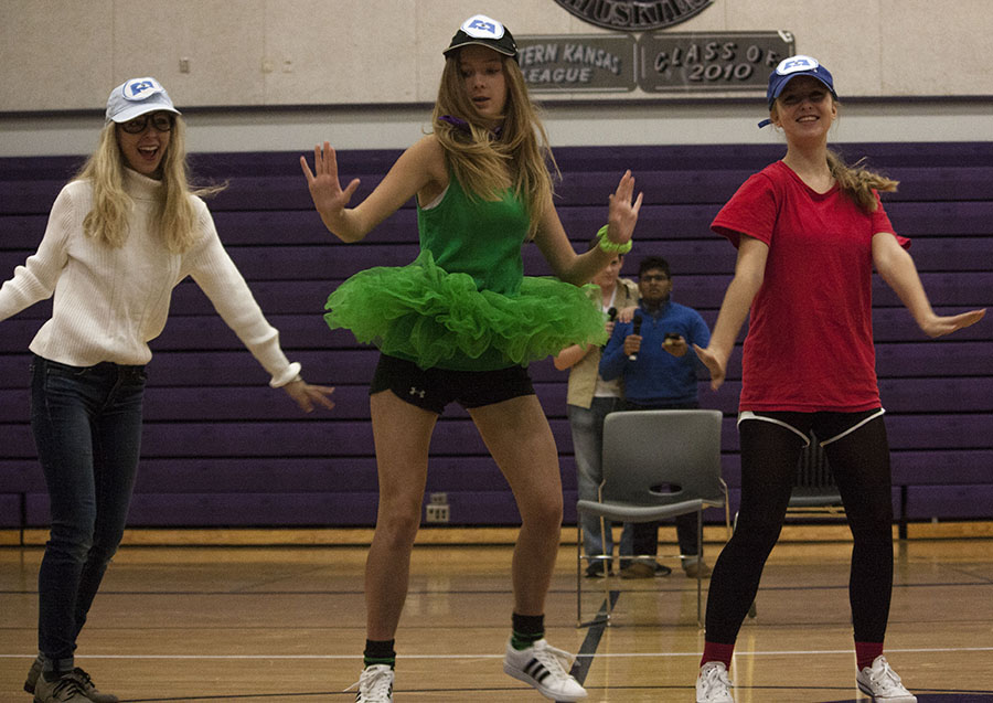 Juniors Zoe Roswold, Anna Avery and Olivia Loepp dance during the junior skit on Pixar day Oct. 3.