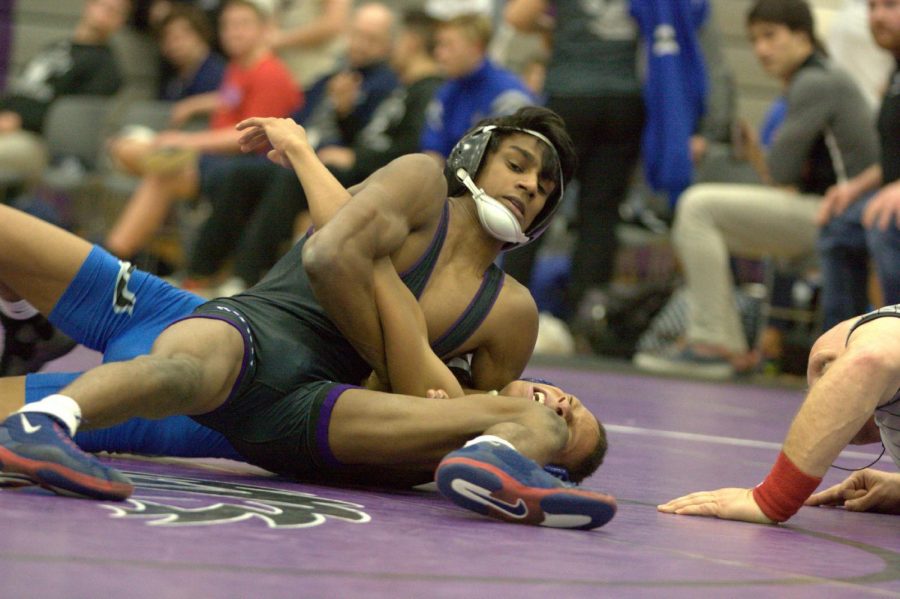 In the second period, senior Rudhra Thakur attempts to pin his opponent on Jan. 31.
