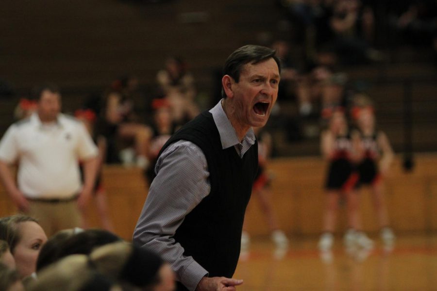 Head coach Brian Bubalo screams at an official during the Huskies substate matchup with Shawnee Mission Northwest at SMNW Feb. 27. The Huskies were defeated by the Cougars, 43-34.
