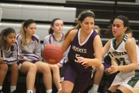 Huskies edge Timberwolves, 59-46