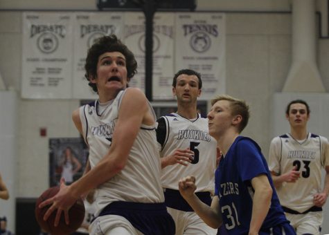 Chapman and Johnson go for career-highs; Huskies defeat Trailblazers in sub-state, 77-34
