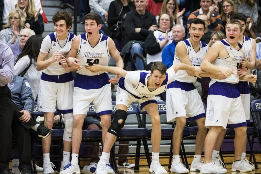 Members+of+the+Blue+Valley+Northwest+bench+react+to+a+play+during+the+Huskies+Sweetheart+game+matchup+with+Blue+Valley+West+at+BVNW+Feb.+9.+The+Huskies+defeated+the+Jaguars%2C+60-32.