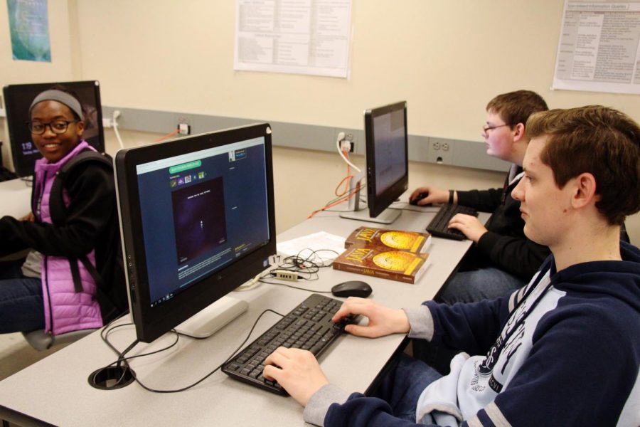 Junior Sam Rauter plays Cool Math Games in his sixth hour Computer Programming class after completing his coding. 