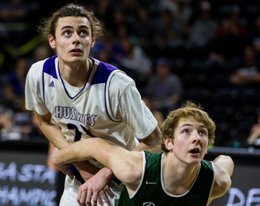 Blue Valley Northwest senior forward Parker Braun (23) watches a free throw attempt during the first half of the Huskies matchup with Derby at Charles Koch Arena. The Huskies defeated the Panthers, 82-61.