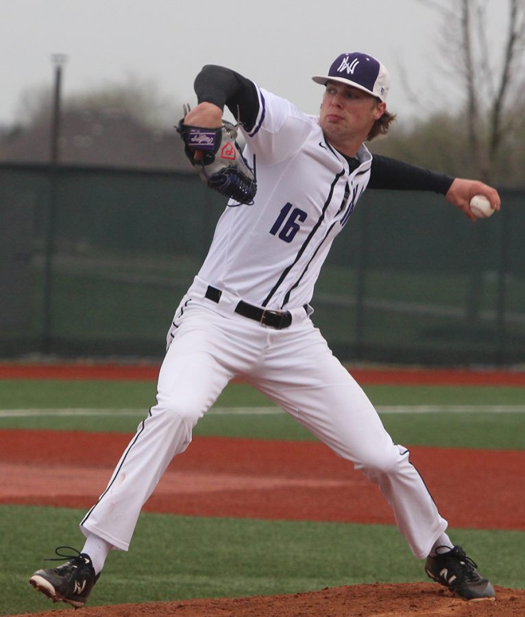 Senior pitcher Will Dennis prepares to throw a pitch against Jefferson City High School. Dennis pitched 6 1/3 innings allowing one run on four hits, and struck out three Jefferson City batters. The Huskies defeated Jefferson City 3-1 at Lawrence Free State April 21.