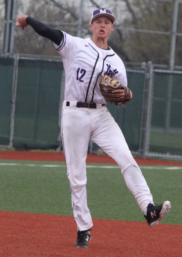 Sophomore shortstop Ryan Callahan throws the ball to first for an out against Jefferson City High School. The Huskies defeated Jefferson City 3-1 at Lawrence Free State April 21.