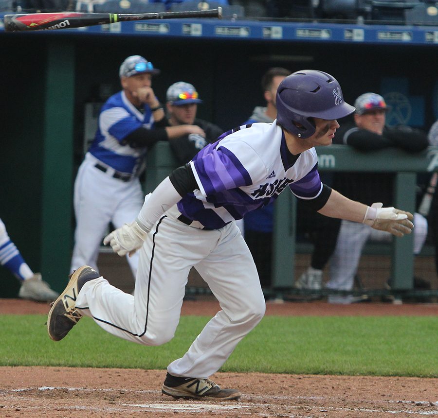 Senior Clayton Leathers runs to first base after an RBI groundout during the second inning of the Huskies matchup with Summit Christian Academy at Kauffman Stadium April 21. The Huskies defeated the Eagles, 6-2. 