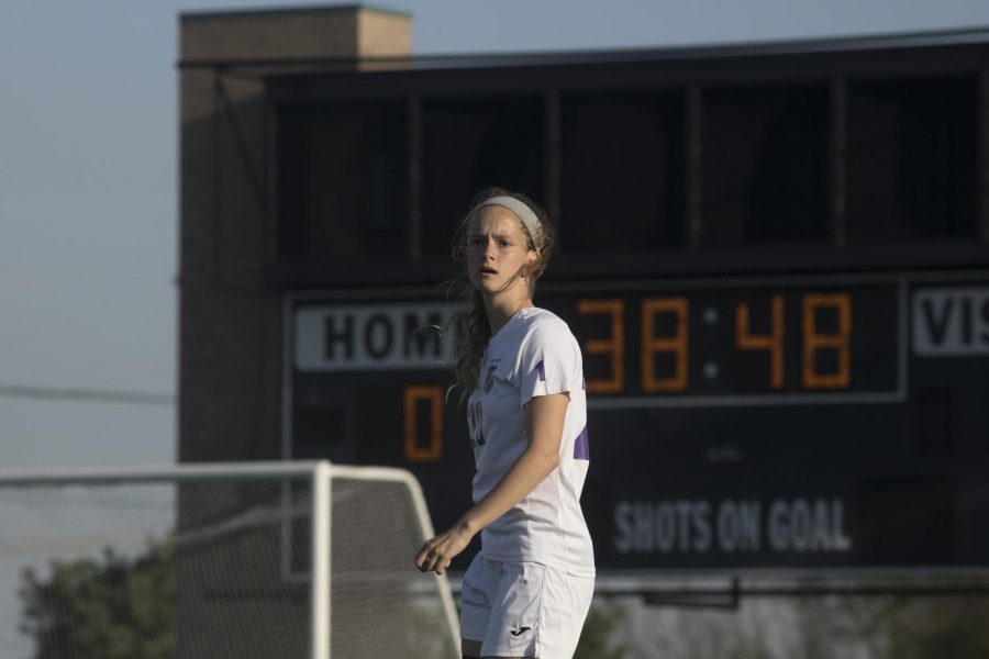 Senior defender Gabrille Nabors looks upon the field against Shawnee Mission West Monday, April 30. The Huskies were defeated by the Vikings, 3-1. 