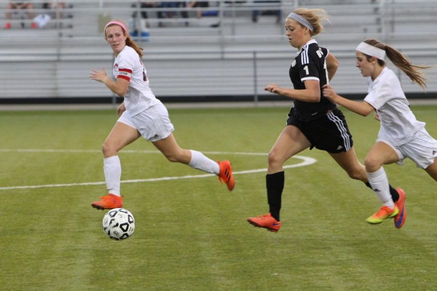 Senior Grace Fugate dribbled up the field Monday, May 14 in the first game of regionals.