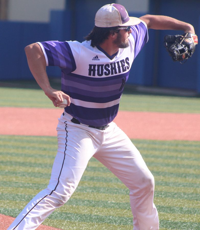 Senior third baseman Josh Fiene prepares to throw the ball against Derby High School at Hoglund Ballpark May 25. The Huskies defeated the Panthers 4-3.