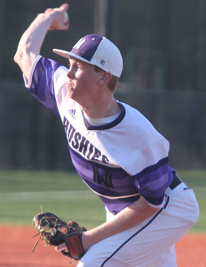 After senior Max Abromovich pitched six innings, junior David Kephart pitched for one inning allowing two runs against Shawnee Mission East at Shawnee Mission East High School May 7. The Huskies defeated the Lancers 8-5.