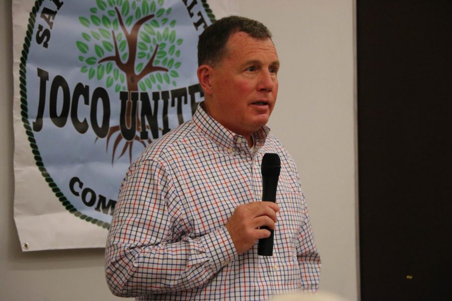 President of Joco United, Mark Schmid, discusses the goals of Joco United on Aug. 29 at the Overland Park fieldhouse. 