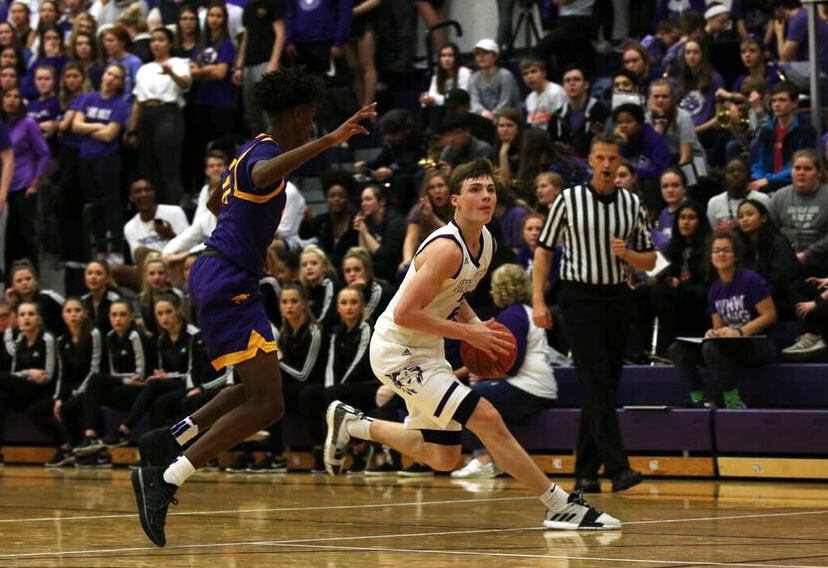 Senior Christian Braun drives to the basket during their game against Blue Springs, Friday Nov. 30. BVNW defeated BSHS, 70-40.