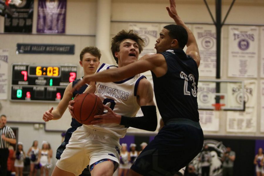 Senior Christian Braun drives to the basket during the Huskies second matchup with the Mustangs Jan. 11. BVNW defeated BVN 72-56.