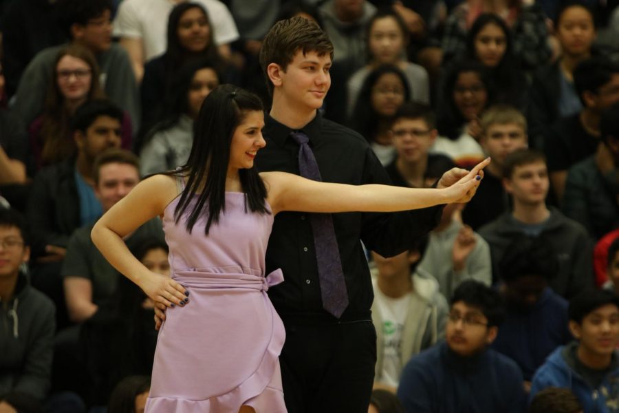 Junior Sami Randazzo and sophomore Parker Jones dance during the assembly Friday March 1. 