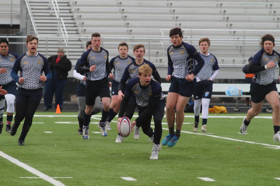 BVHS junior Tyler Kelso starting the play during rugby game against the Olathe Gents, Saturday March 2. 