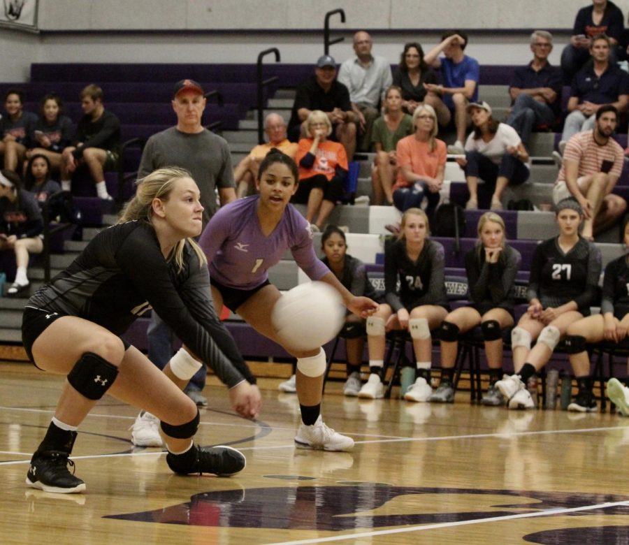 Junior Delany Granholm digs the ball in a volleyball game for Blue Valley Northwest. BVNW defeated BVN, 3 sets to 1. 