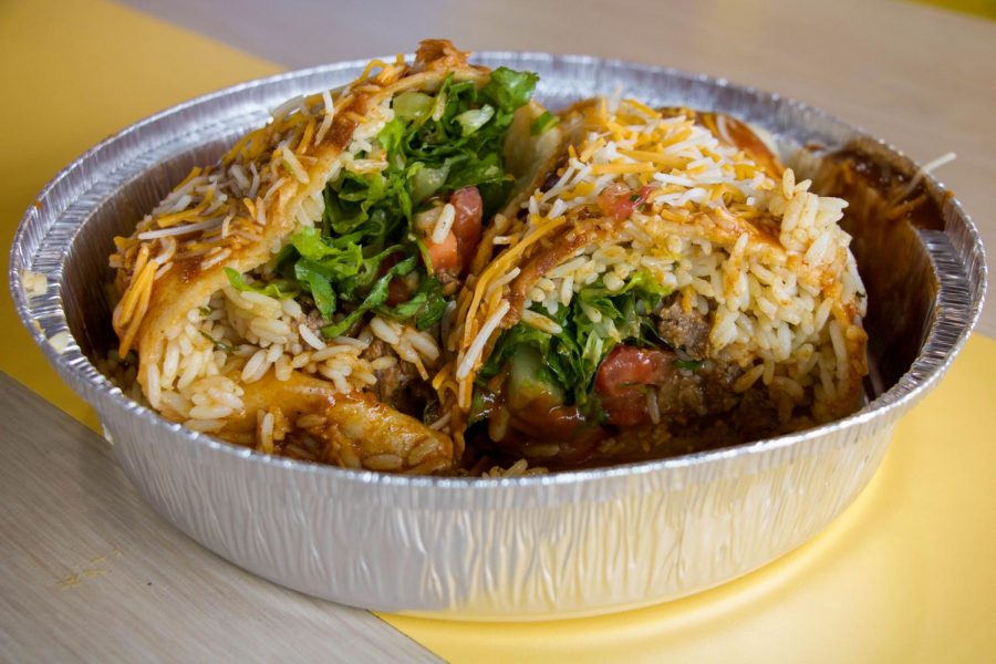 A+make+your+own+burrito+sits+on+the+a+colorful+table+at+Costa+Vida+on+159th+and+Antioch.
