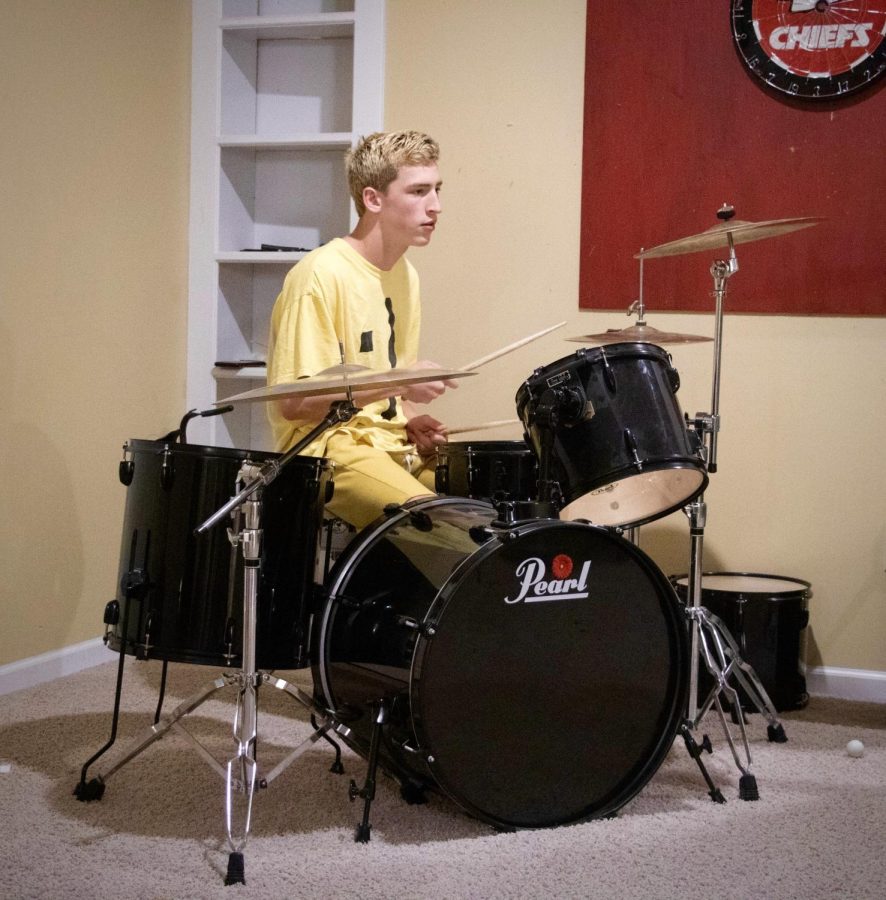 Senior Watchman Whitworth plays the drum set with his band, on Sep. 6. 