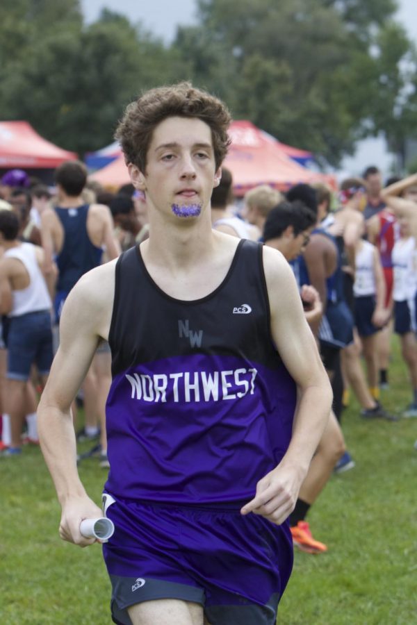 Senior Jay Lewis runs in the cross country relay, on Oct. 10.
