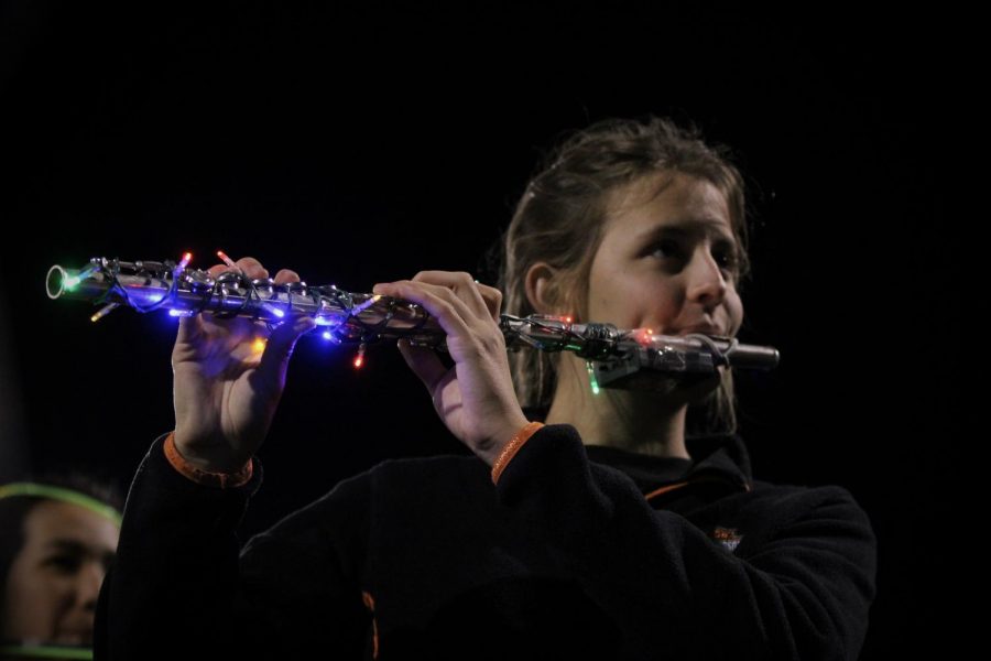 Junior Amy Winkler plays the flute during the Glow Show on Nov. 2 at the DAC.