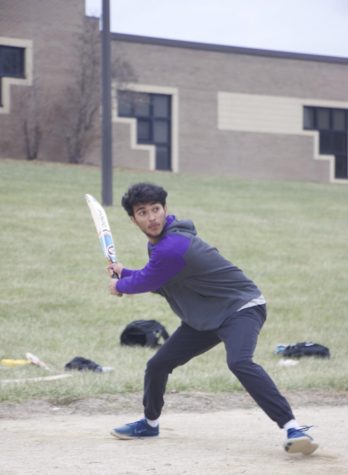Senior Samanyu Pusuluri swings to hit the cricket ball on, Nov. 16. “The motto we created for this league is ‘Diversity #1’ which is something we
all strive to follow. Playing this game allows us to reconnect back to our culture and for others they get to learn about a new one,”
Senior captain Samanyu Pusuluri said.