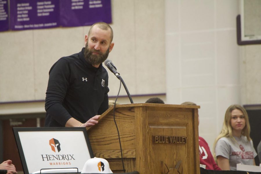 Football coach Clint Rider speaks during the spring athletic signing ceremony, Feb. 6. 