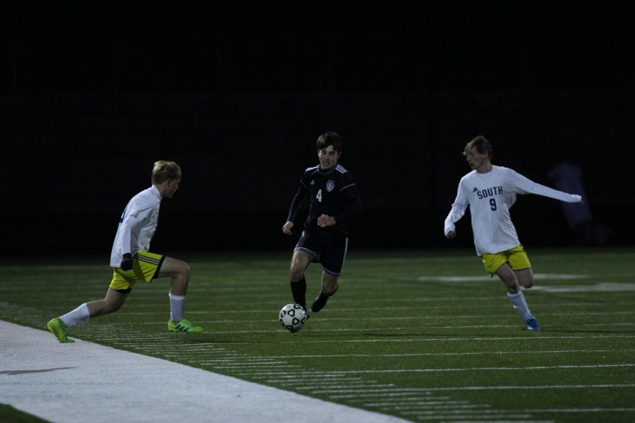 Current senior Will Vancrum dribbles the ball during the varsity substate game on Oct. 29 2019