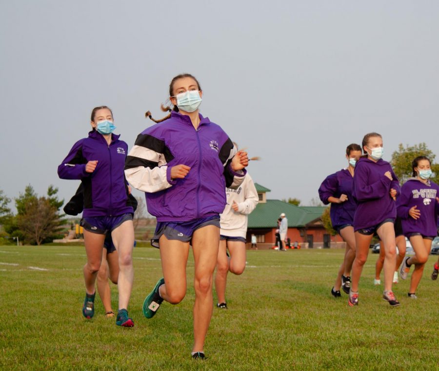 Senior Riley Beach runs in a meet on Sept. 19. The girls cross country team took first place in regionals.