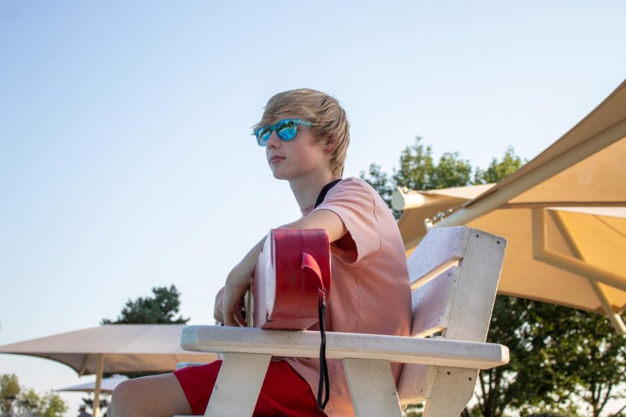Sophomore Sterling Smith works his job as a lifeguard, Sept. 6.