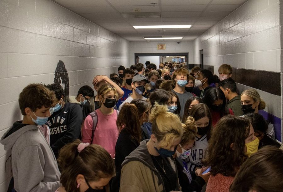 Packed into an unorganized mass, hundreds of students wait to enter the cafeteria during Husky Halftime, Sept. 17.