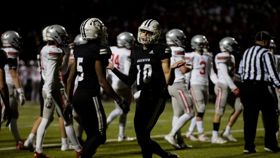 Senior quarterback Mikey Pauley (10) celebrates after scoring a touchdown in the 6A East substate championship, Nov. 19.