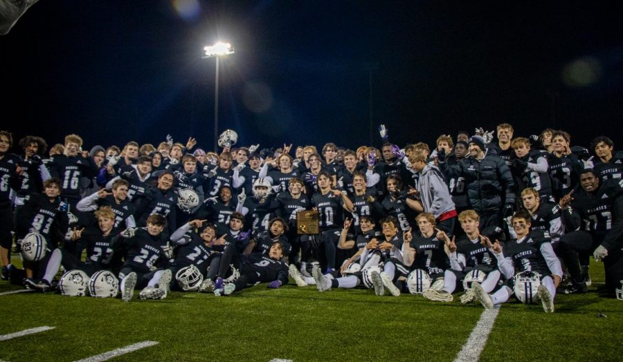 The Northwest football team poses with the trophy after winning sectionals, Nov. 12.