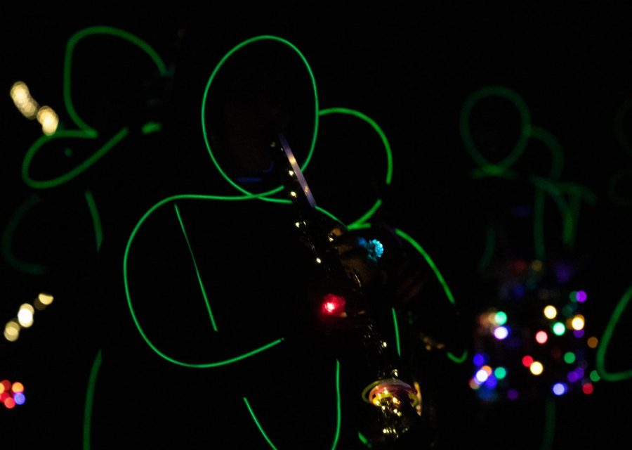 The Howlin Husky Marching Band performs at their annual glow show, Oct. 30.