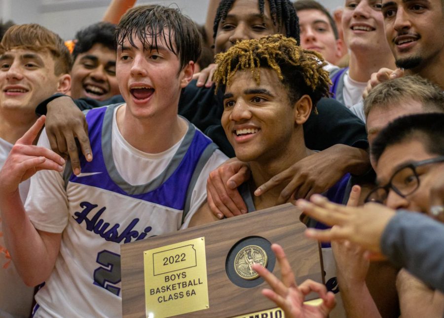 Senior Joey Robinson and junior Grant Stubblefield celebrate after winning the Sub-State championship, Mar. 5.